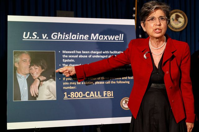 Audrey Strauss stands in of a presentation board showing a photograph of Jeffrey Epstein and Ghislaine Maxwell